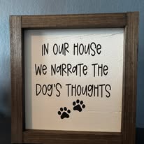 In Our House We Narrate The Dog's Thoughts — handmade framed sign with paw prints